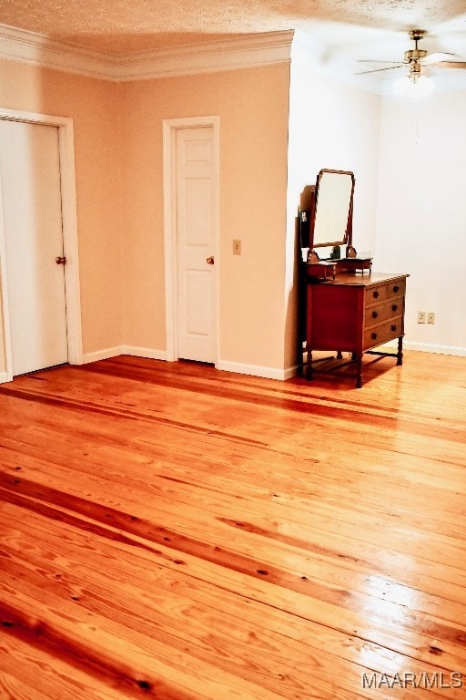 813 Lake Region Cir, Wetumpka, AL 36092 - spare room featuring ornamental molding, a ceiling fan, light wood-style flooring, and baseboards