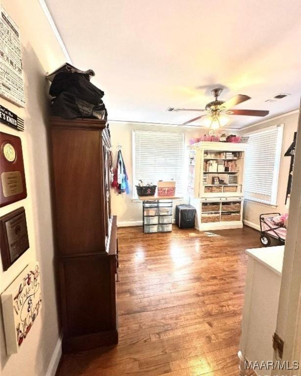 1915 Mckinley Ave, Montgomery, AL 36107 - interior space with baseboards, ceiling fan, and wood finished floors