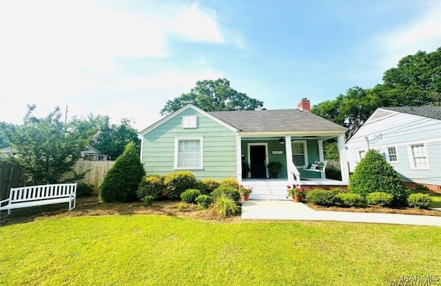 1915 Mckinley Ave, Montgomery, AL 36107 - bungalow-style home featuring covered porch and a chimney