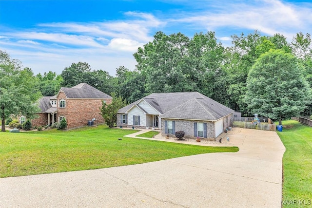 190 Sherwood Trl, Wetumpka, AL 36093 - view of front of home featuring driveway, brick siding, and a garage