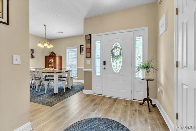 190 Sherwood Trl, Wetumpka, AL 36093 - foyer entrance with light wood finished floors and plenty of natural light
