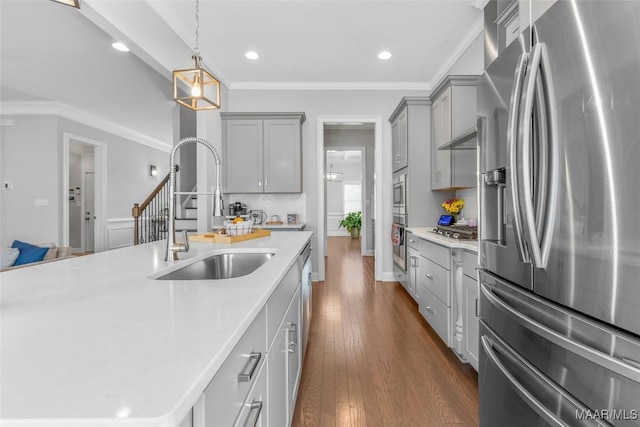 20 Tori Ct, Millbrook, AL 36054 - kitchen with appliances with stainless steel finishes, gray cabinetry, a sink, light countertops, and recessed lighting