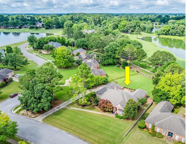 8054 Lakeridge Dr, Montgomery, AL 36117 - aerial view of residential area with a nearby body of water and a tree filled landscape