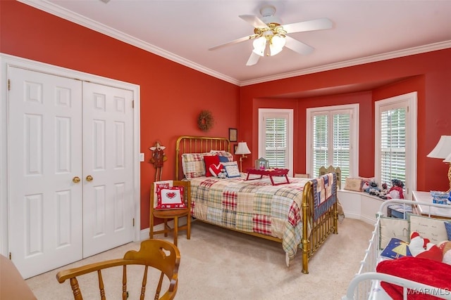 8054 Lakeridge Dr, Montgomery, AL 36117 - carpeted bedroom with ornamental molding, ceiling fan, baseboards, and a closet