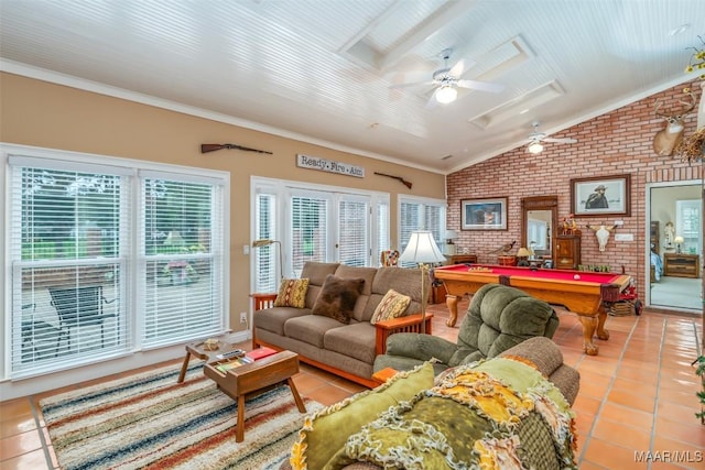 8054 Lakeridge Dr, Montgomery, AL 36117 - living room with billiards table, brick wall, healthy amount of natural light, tile patterned floors, and lofted ceiling