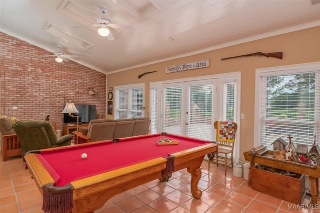 8054 Lakeridge Dr, Montgomery, AL 36117 - playroom with brick wall, light tile patterned flooring, lofted ceiling, pool table, and healthy amount of natural light