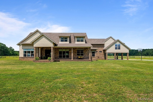 511 Mehearg Rd, Wetumpka, AL 36092 - craftsman house with a front lawn, roof with shingles, and stone siding