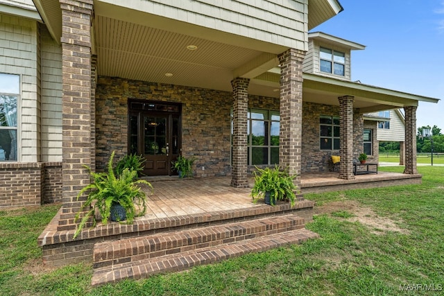511 Mehearg Rd, Wetumpka, AL 36092 - entrance to property featuring covered porch and a yard