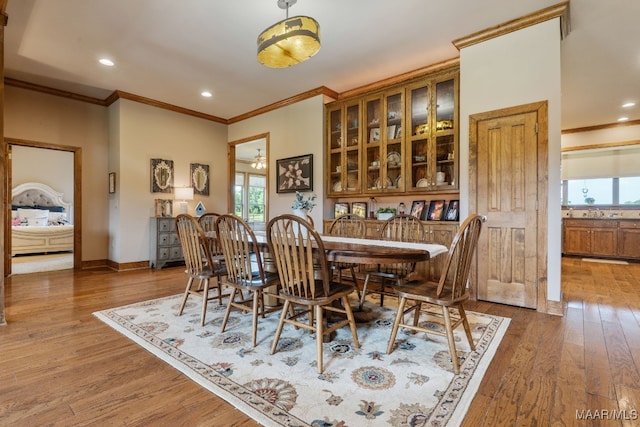 511 Mehearg Rd, Wetumpka, AL 36092 - dining area featuring crown molding, healthy amount of natural light, light wood-type flooring, and recessed lighting