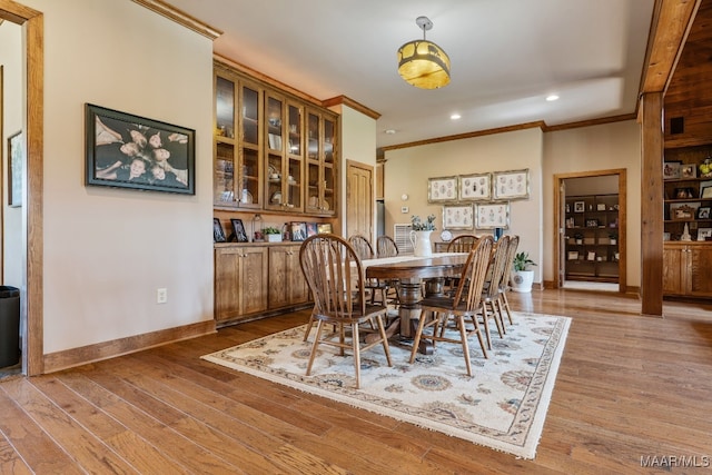 511 Mehearg Rd, Wetumpka, AL 36092 - dining area featuring ornamental molding, recessed lighting, and wood finished floors