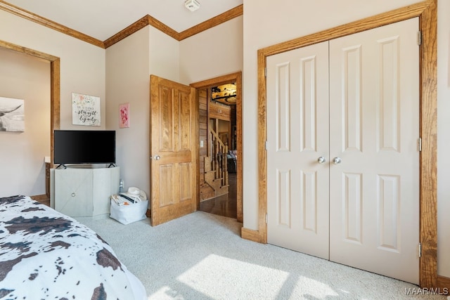 511 Mehearg Rd, Wetumpka, AL 36092 - carpeted bedroom with ornamental molding and a closet