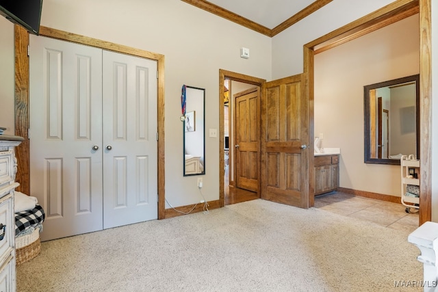 511 Mehearg Rd, Wetumpka, AL 36092 - bedroom featuring ornamental molding, a closet, and carpet floors