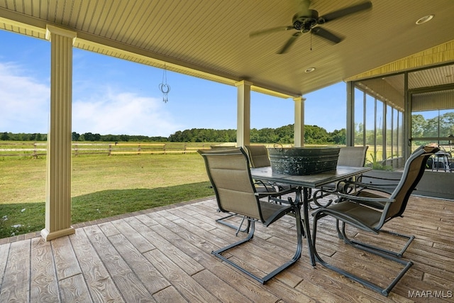 511 Mehearg Rd, Wetumpka, AL 36092 - deck featuring a view of rural / pastoral area, a ceiling fan, outdoor dining space, and a lawn