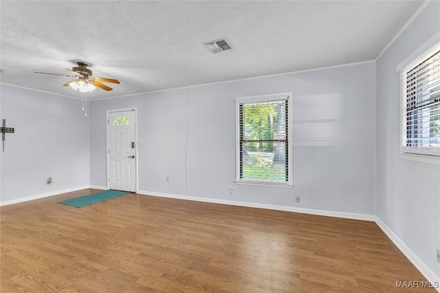 211 Murfee Dr, Prattville, AL 36066 - spare room with ceiling fan, wood finished floors, crown molding, and baseboards
