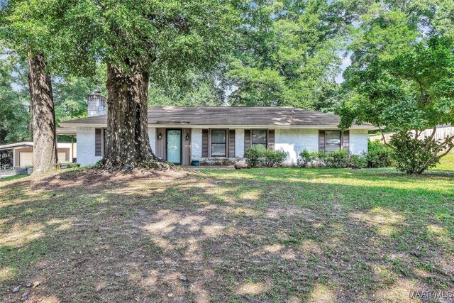 211 Murfee Dr, Prattville, AL 36066 - view of front of house with a chimney and a front lawn