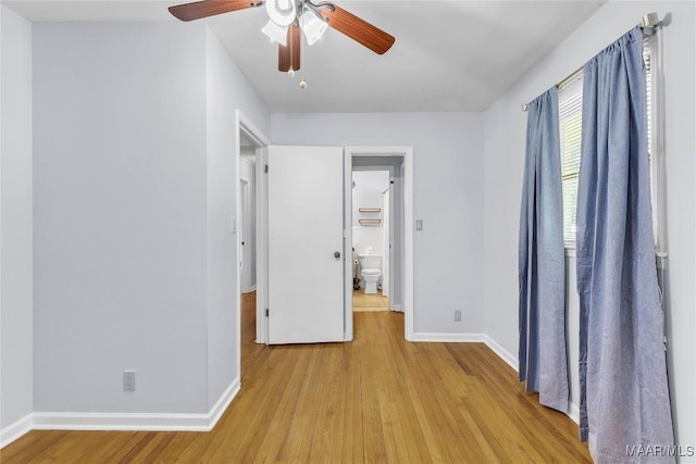 211 Murfee Dr, Prattville, AL 36066 - unfurnished bedroom with light wood finished floors, baseboards, a ceiling fan, and ensuite bathroom