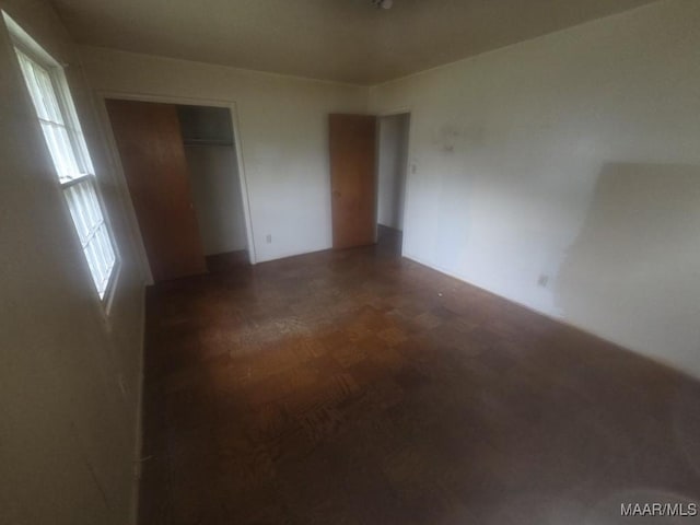 2930 Milton Rd, Montgomery, AL 36110 - unfurnished bedroom with a closet and multiple windows
