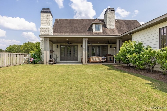 3644 Lockwood Ln, Montgomery, AL 36111 - rear view of house with a chimney, ceiling fan, a fenced backyard, a patio area, and brick siding