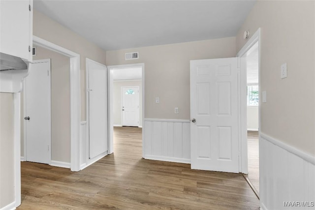 3556 Prince George Dr, Montgomery, AL 36109 - spare room with wood finished floors, a smoke detector, and wainscoting