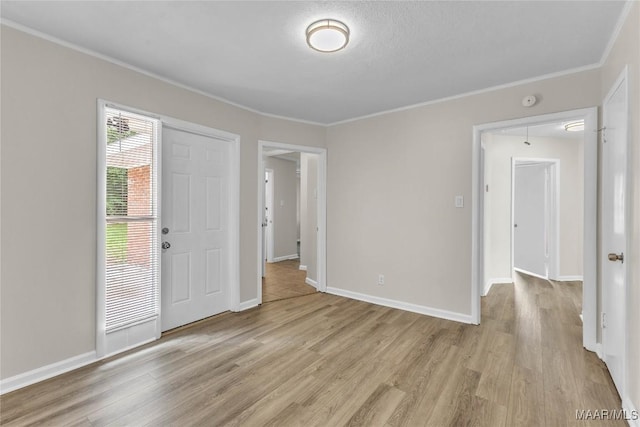 3556 Prince George Dr, Montgomery, AL 36109 - unfurnished room featuring light wood finished floors, crown molding, and baseboards