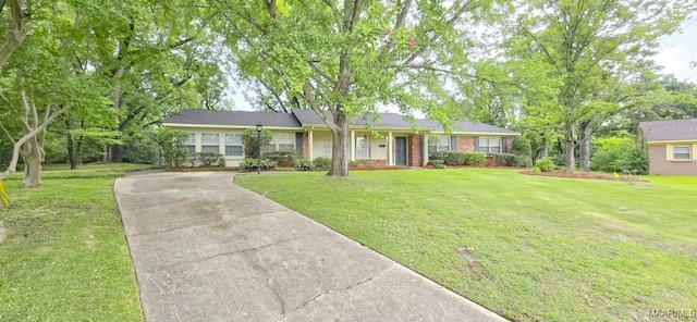 2728 Oxford Dr, Montgomery, AL 36111 - single story home with driveway, a front yard, and brick siding