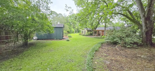 2728 Oxford Dr, Montgomery, AL 36111 - view of yard featuring a storage unit
