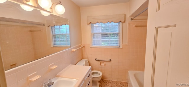2728 Oxford Dr, Montgomery, AL 36111 - bathroom featuring tile walls, tile patterned floors, wainscoting, bathing tub / shower combination, and vanity
