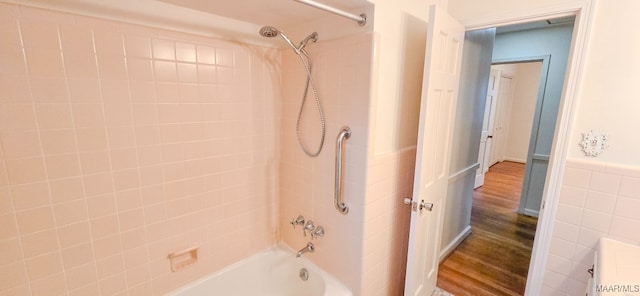 2728 Oxford Dr, Montgomery, AL 36111 - bathroom featuring bathing tub / shower combination and wood finished floors