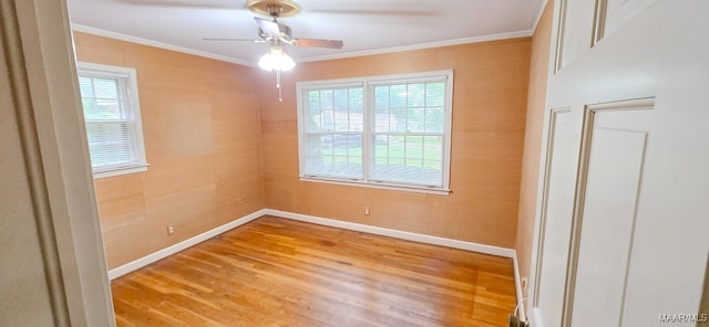 2728 Oxford Dr, Montgomery, AL 36111 - spare room featuring ornamental molding, light wood-style flooring, and ceiling fan