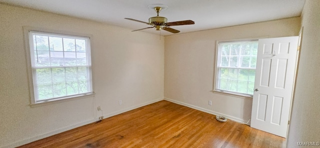 2728 Oxford Dr, Montgomery, AL 36111 - unfurnished room featuring healthy amount of natural light, wood finished floors, and ceiling fan