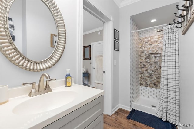 28 Lake Region Dr, Wetumpka, AL 36092 - full bathroom with a tile shower, ornamental molding, vanity, wood finished floors, and recessed lighting