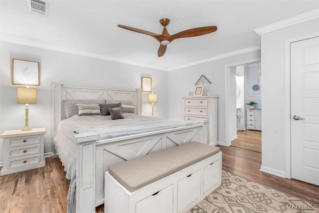 28 Lake Region Dr, Wetumpka, AL 36092 - bedroom featuring light wood finished floors, crown molding, baseboards, and a ceiling fan