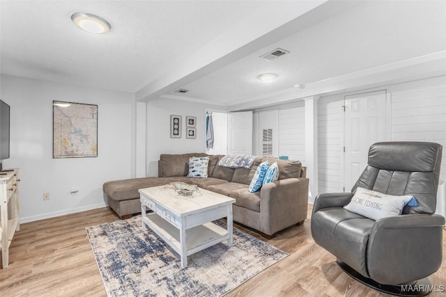 28 Lake Region Dr, Wetumpka, AL 36092 - living room with light wood finished floors, baseboards, and a textured ceiling