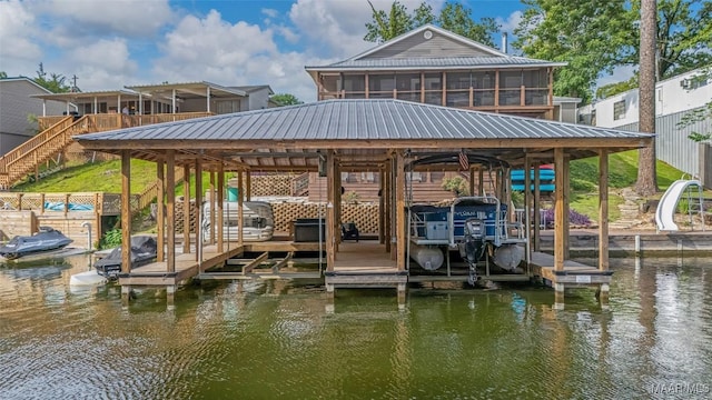 28 Lake Region Dr, Wetumpka, AL 36092 - dock area featuring boat lift, stairway, and a water view