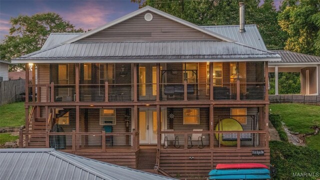 28 Lake Region Dr, Wetumpka, AL 36092 - rear view of house featuring stairway and metal roof
