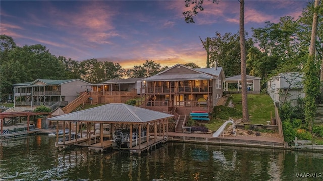 28 Lake Region Dr, Wetumpka, AL 36092 - dock featuring stairs, boat lift, and a deck with water view