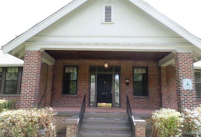 812 E Fairview Ave, Montgomery, AL 36106 - view of exterior entry with covered porch and brick siding