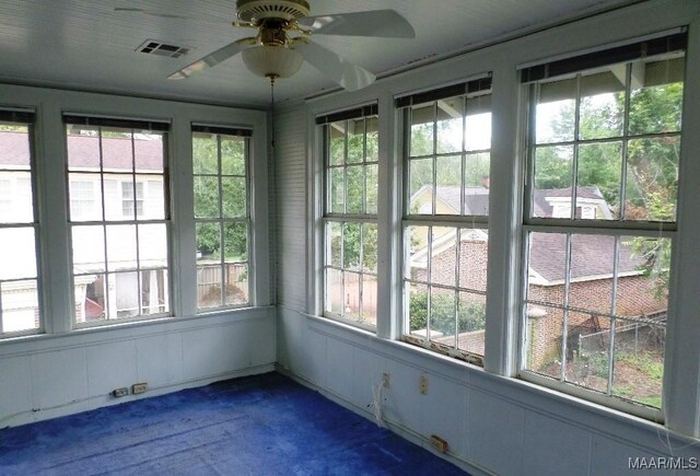 812 E Fairview Ave, Montgomery, AL 36106 - unfurnished sunroom featuring carpet flooring
