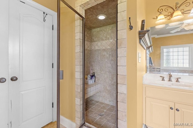 18490 US Highway 31st Rd, Clanton, AL 35045 - bathroom with a stall shower, vanity, ornamental molding, and ceiling fan