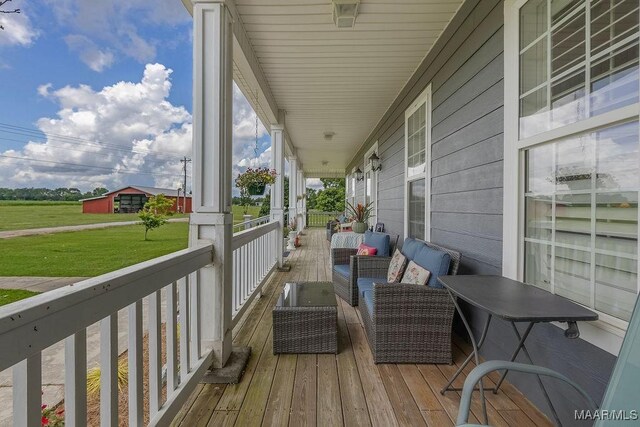 18490 US Highway 31st Rd, Clanton, AL 35045 - wooden porch with outdoor lounge area and a yard