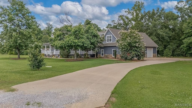 18490 US Highway 31st Rd, Clanton, AL 35045 - view of front of house with driveway, a front yard, stone siding, and a garage