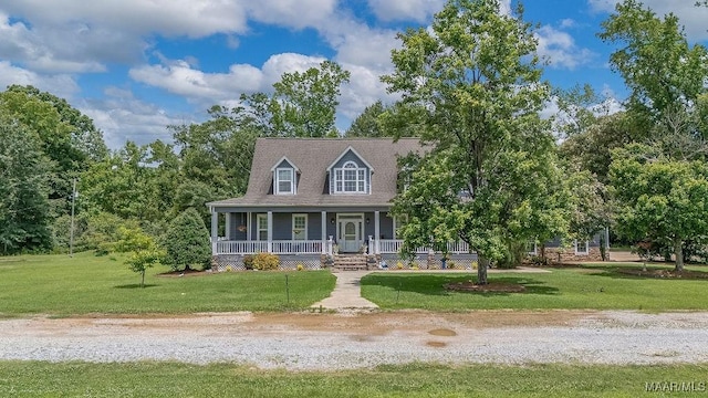 18490 US Highway 31st Rd, Clanton, AL 35045 - cape cod home featuring covered porch and a front yard