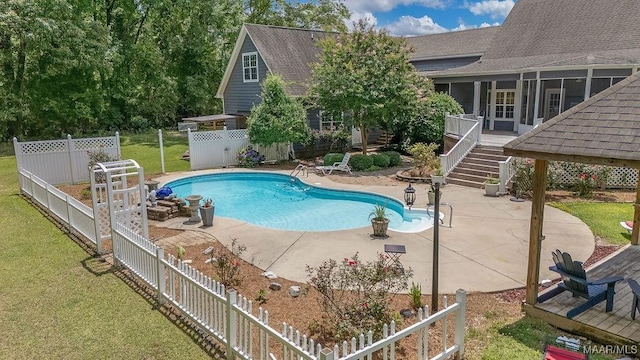18490 US Highway 31st Rd, Clanton, AL 35045 - view of pool featuring a fenced backyard, stairway, a patio, and a sunroom