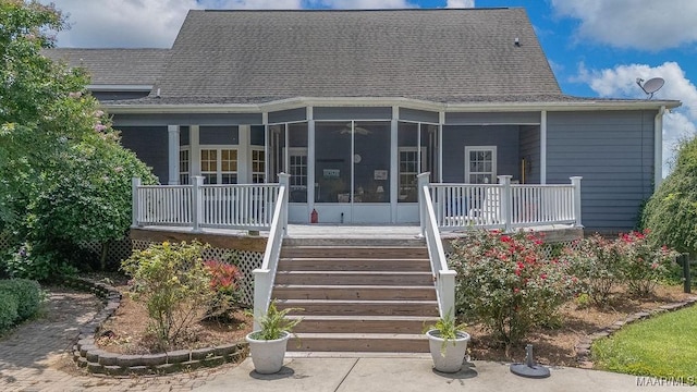 18490 US Highway 31st Rd, Clanton, AL 35045 - back of property with stairs, a sunroom, a porch, and a shingled roof