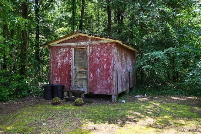 76 Willow Springs Rd, Wetumpka, AL 36093 - view of shed with a wooded view