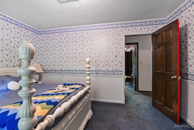 76 Willow Springs Rd, Wetumpka, AL 36093 - bedroom featuring a textured ceiling, wallpapered walls, crown molding, and dark colored carpet