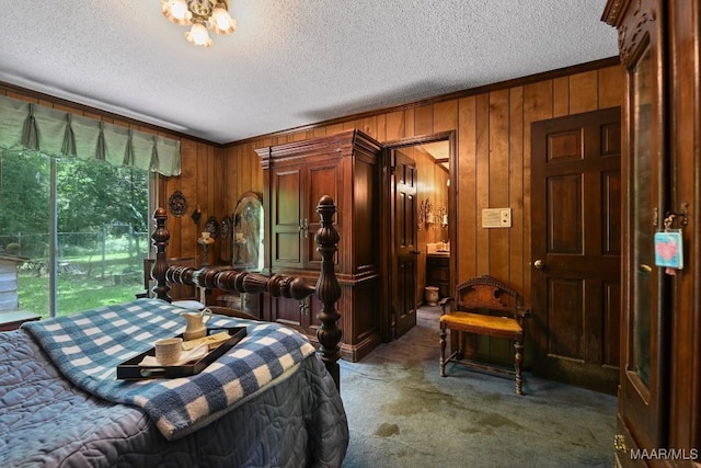 76 Willow Springs Rd, Wetumpka, AL 36093 - carpeted bedroom with wood walls, a textured ceiling, and ornamental molding