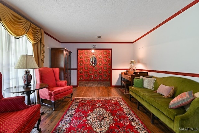 76 Willow Springs Rd, Wetumpka, AL 36093 - living area with wood-type flooring, ornamental molding, and a textured ceiling
