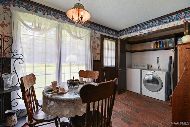 76 Willow Springs Rd, Wetumpka, AL 36093 - dining space with separate washer and dryer, wallpapered walls, brick flooring, a wainscoted wall, and crown molding