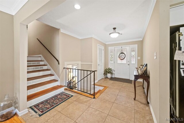 901 Green Forest Dr, Montgomery, AL 36109 - tiled foyer entrance with ornamental molding and stairway